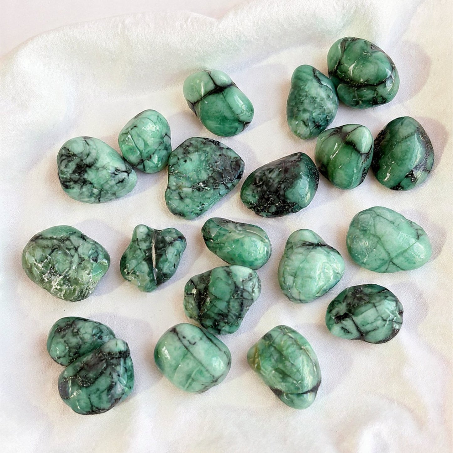 Esmeralda Rolada — Amor, Lealdade, Prosperidade