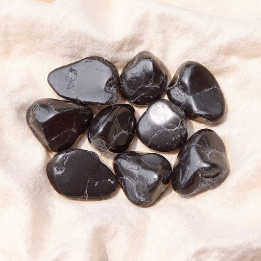 Turmalina Negra Rolada — Proteção, Purificação, Soluções